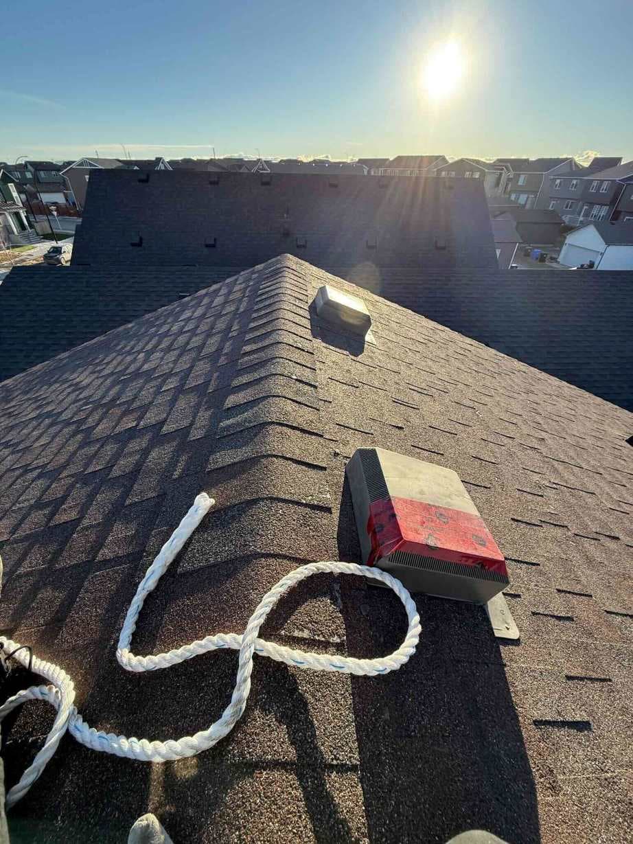 Professional hail damage assessment and repair in Calgary, showing our experts identifying and fixing storm damage